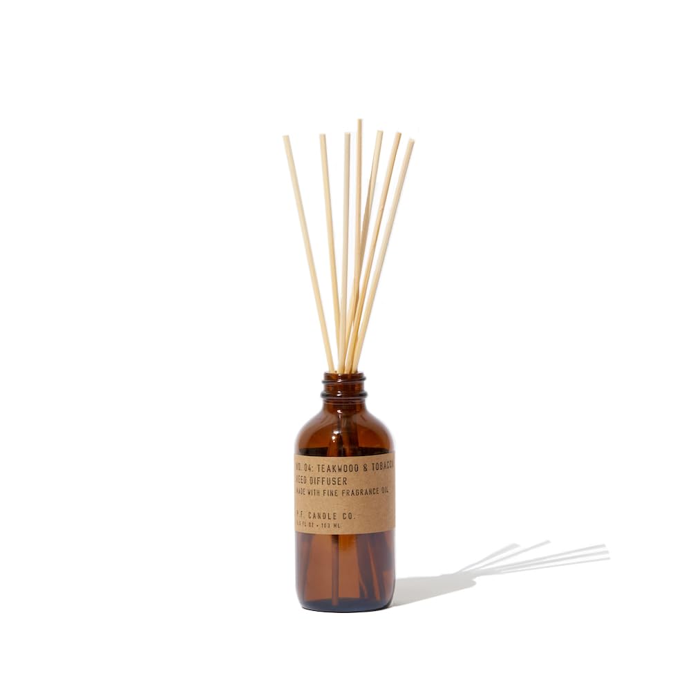 P.F. Candle Co. Teakwood & Tobacco Classic Scented Rattan Reed Diffuser (3.5 fl oz) Amber Glass Jar, Fine Fragrance Oil, Low Maintenance Scent Throw, Made in The U.S.A.