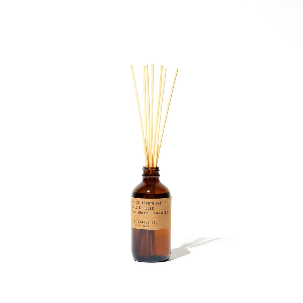 P.F. Candle Co. Teakwood & Tobacco Classic Scented Rattan Reed Diffuser (3.5 fl oz) Amber Glass Jar, Fine Fragrance Oil, Low Maintenance Scent Throw, Made in The U.S.A.