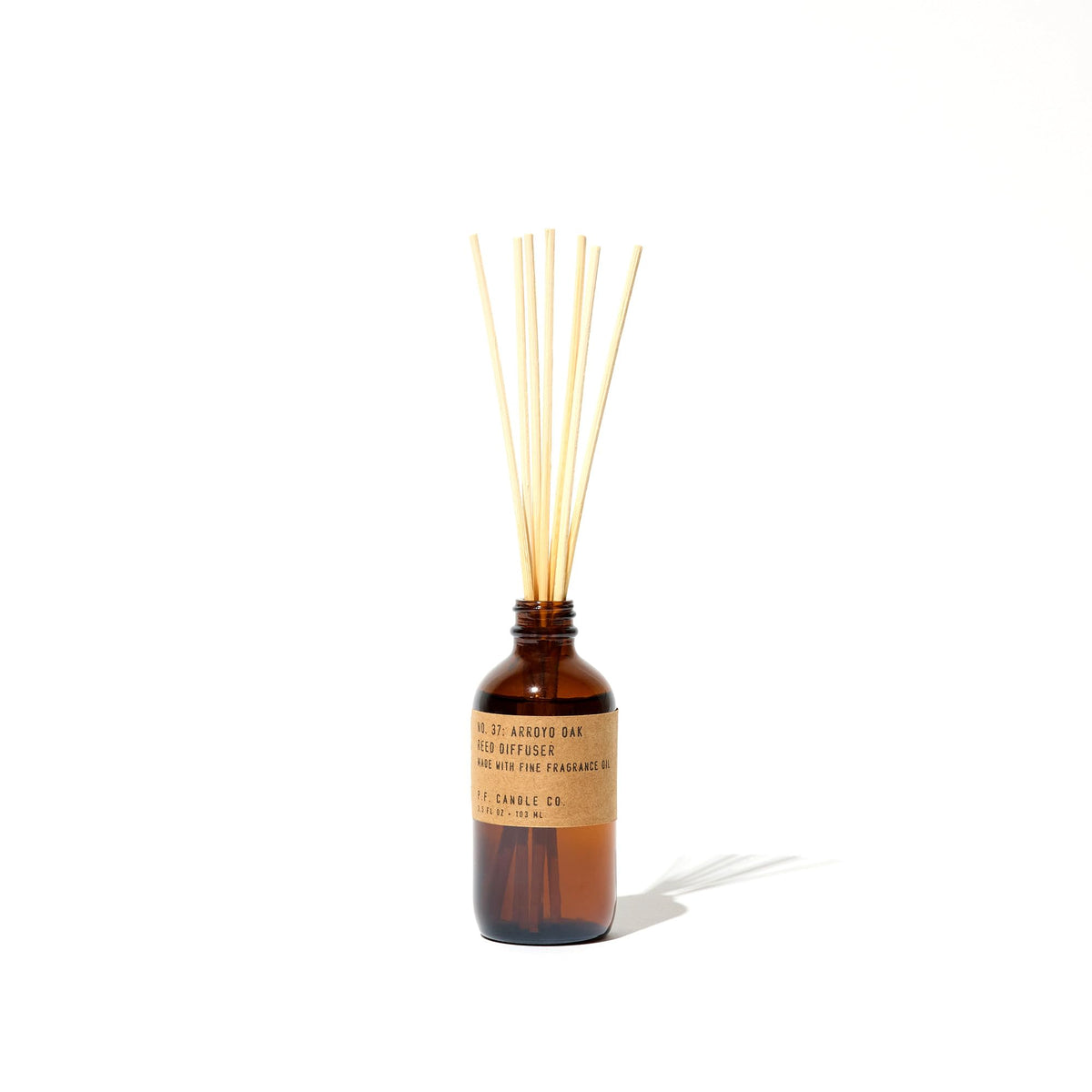 P.F. Candle Co. Teakwood & Tobacco Classic Scented Rattan Reed Diffuser (3.5 fl oz) Amber Glass Jar, Fine Fragrance Oil, Low Maintenance Scent Throw, Made in The U.S.A.